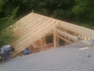 Framing a new roof addition that ties into an existing shingle roof in Inglewood